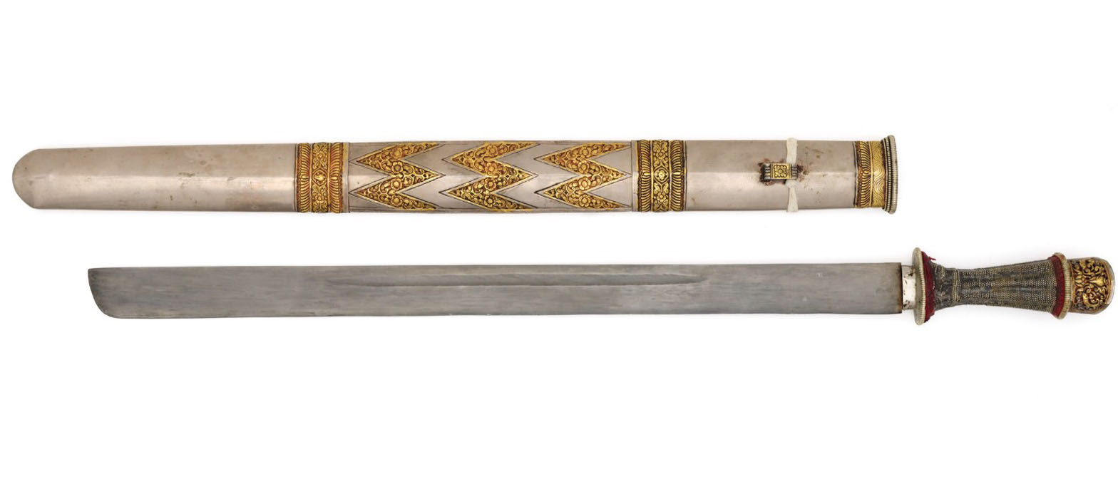Bhutanese patag sword, straight and single-edged with a sharp arc tip and fine longitudinal grooves known as washo