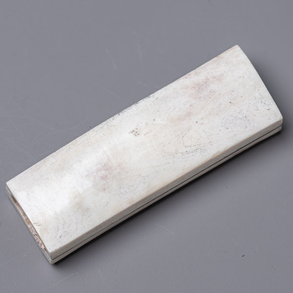Bone handle — pale, smooth and traditional
