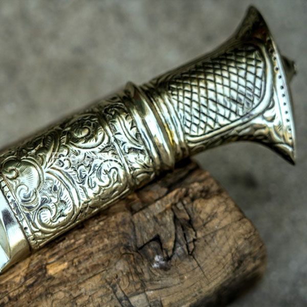 Solid brass handle with a bright golden finish