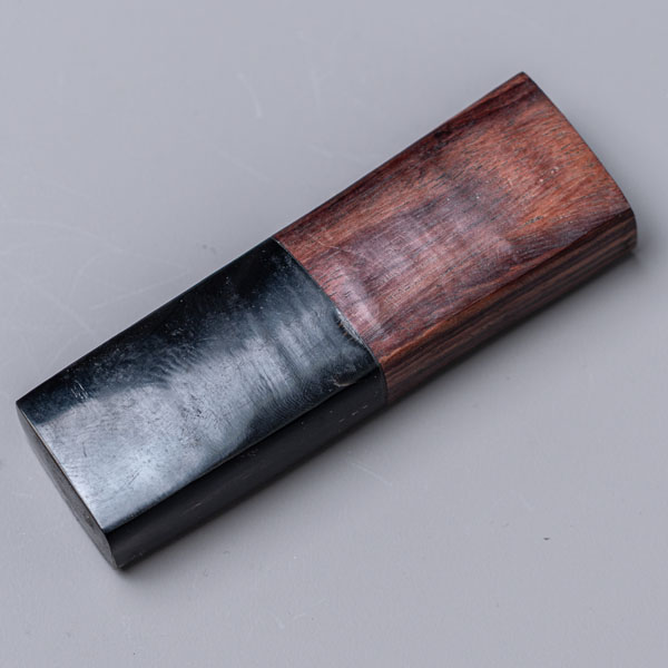 Horn and rosewood layered handle