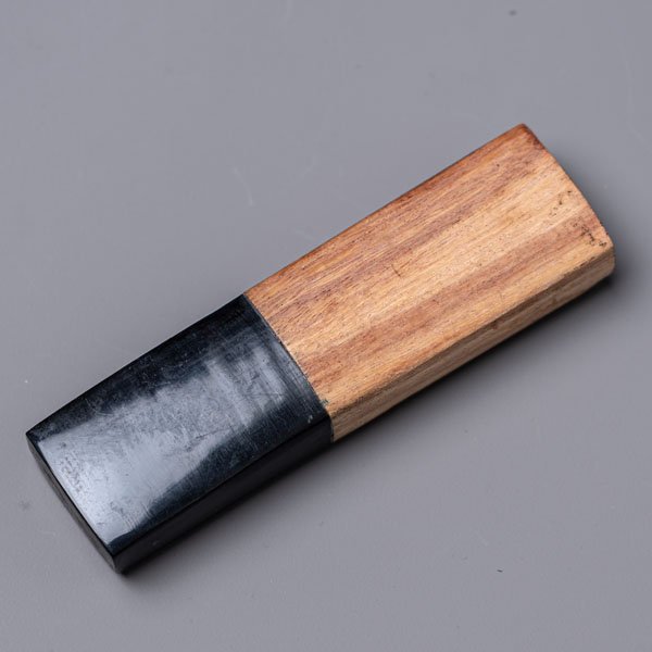Horn and whitewood layered handle