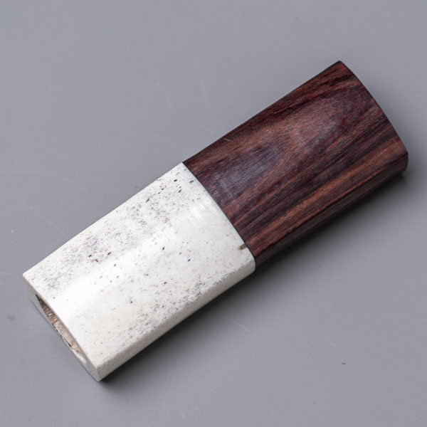 Rosewood handle with pale bone accents