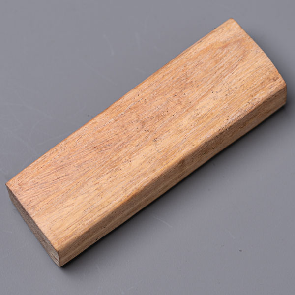 Whitewood handle — pale, lighter-grained hardwood