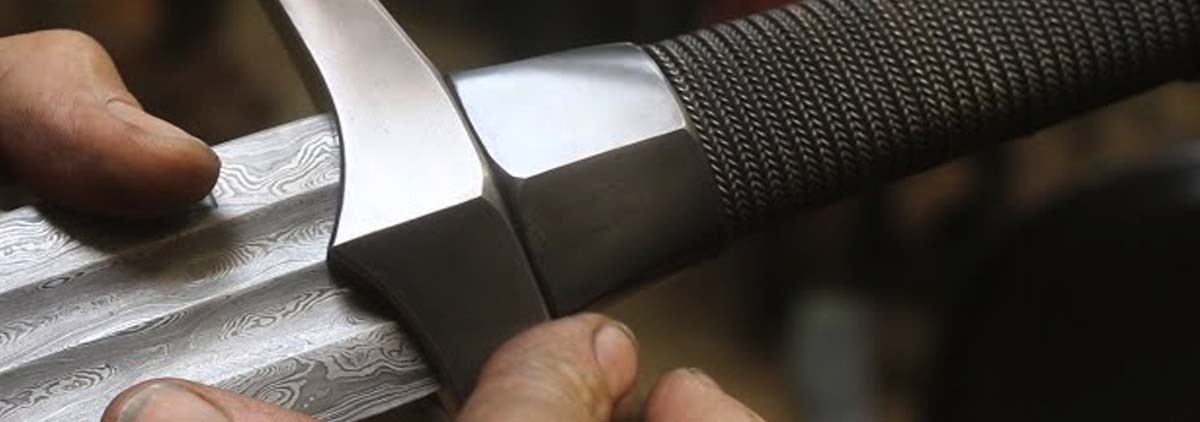 Function of sword fuller showing groove for balance and weight reduction