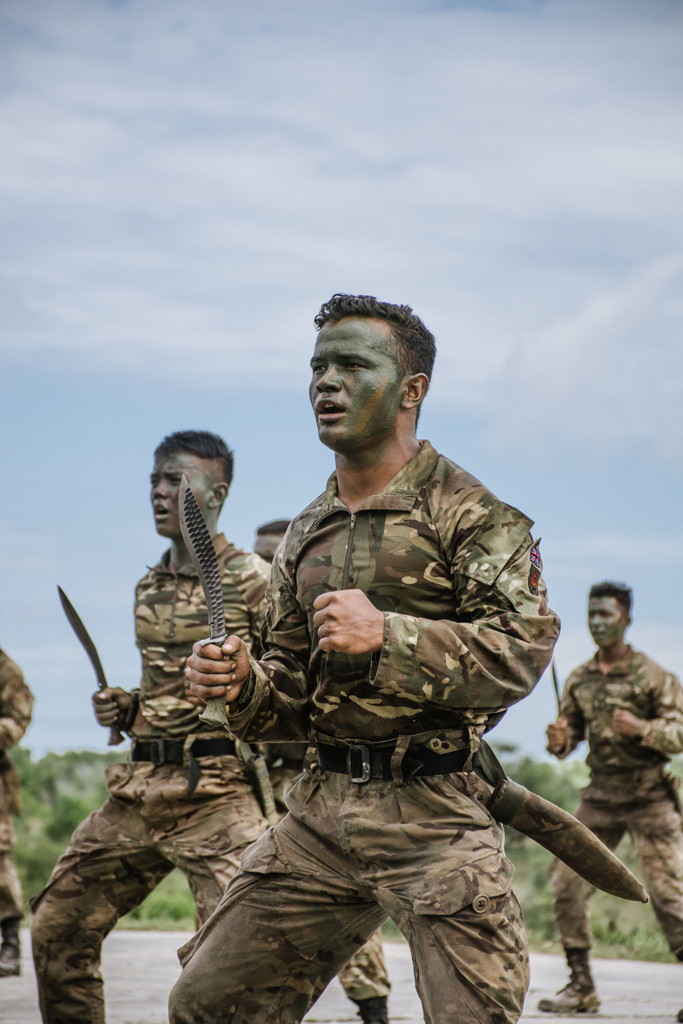 Gurkha soldier holding a kukri in his hand