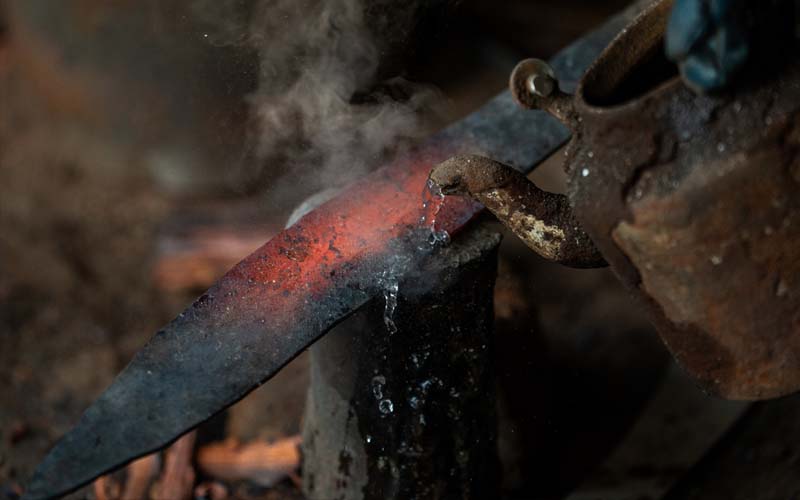 Normalising process at Everest Forge — heating and slow cooling the blade to relieve internal stress and create uniform grain structure in the steel