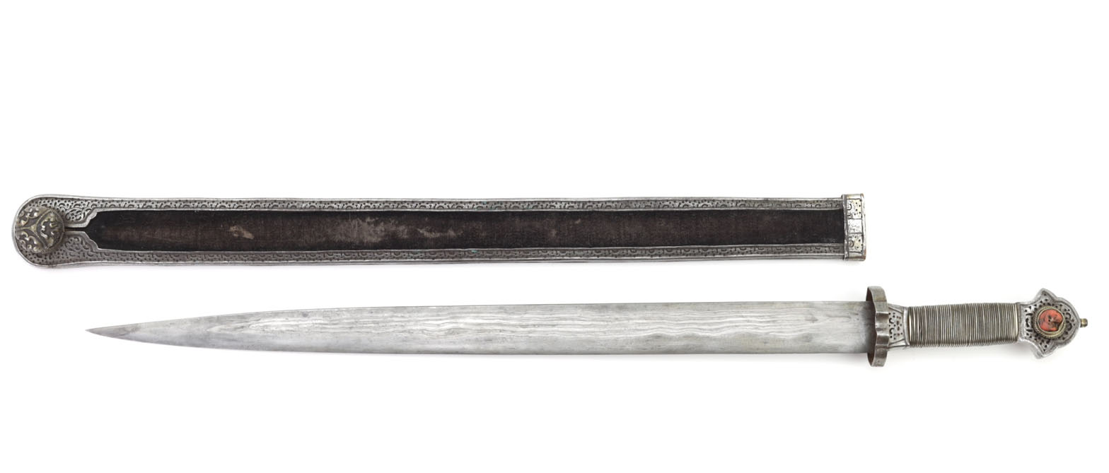 Tibetan ral gri sword with a straight single-edged blade tapering to an acute point, the shorter Tibetan sword type