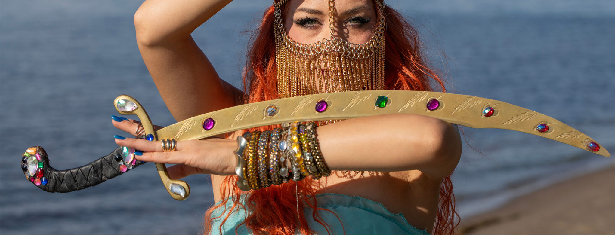 Turkish woman holding a Turkish-style cosplay sword