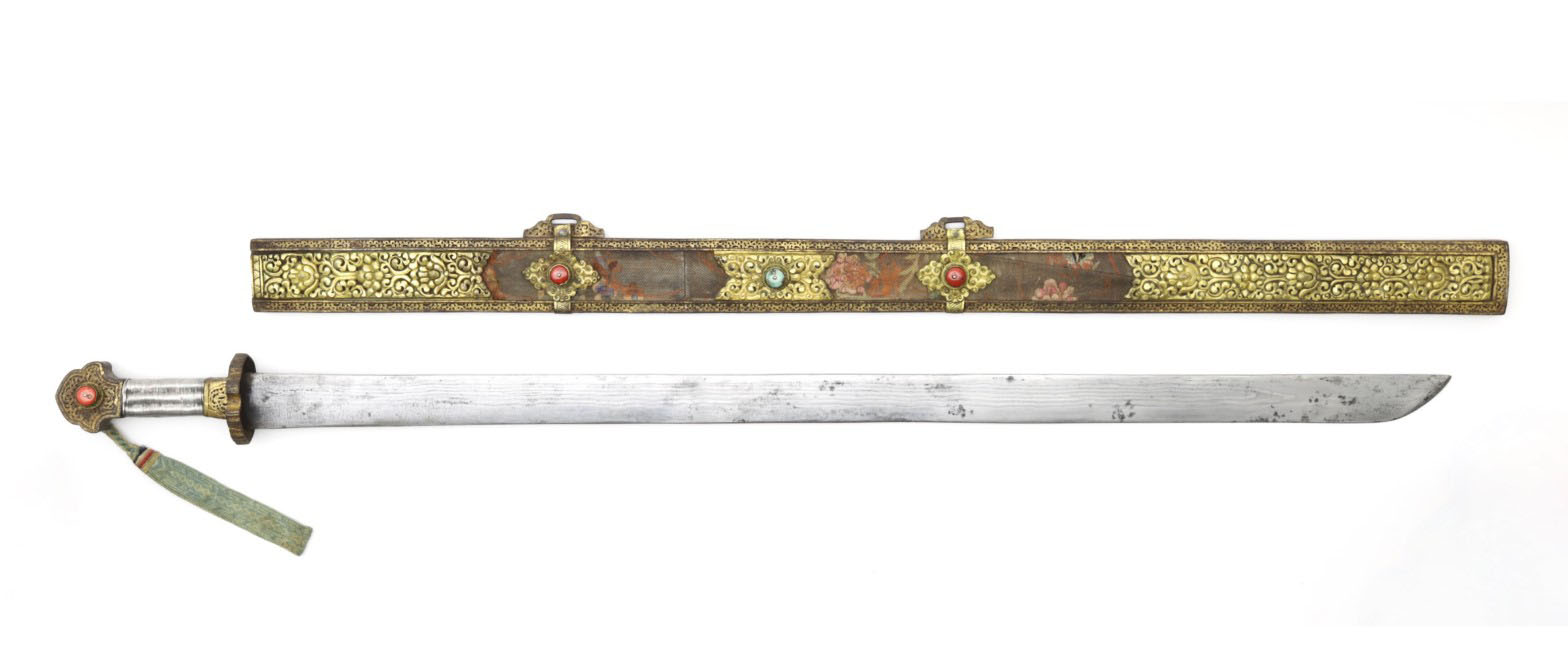 Hand-forged Tibetan dpa'dam long sword with a straight single-edged blade ending in an oblique angled tip, wire-wrapped grip and trefoil pommel