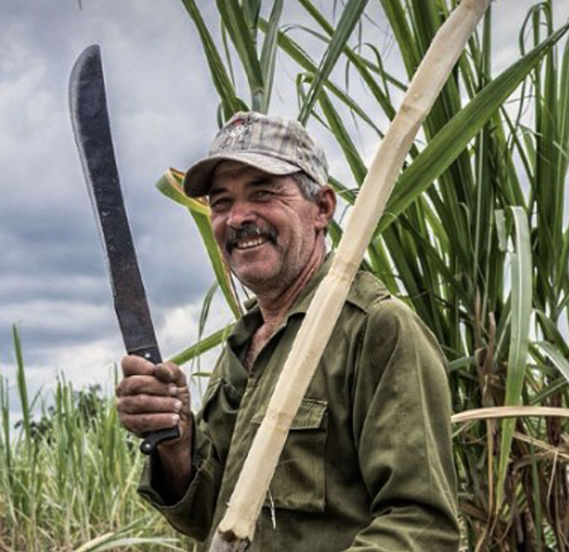 Farmer showing his farming machete
