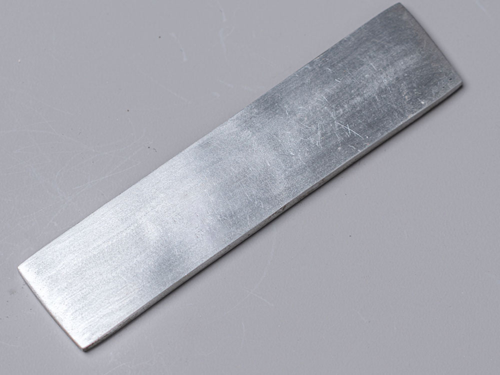 Satin finish blade with a brushed, low-glare surface