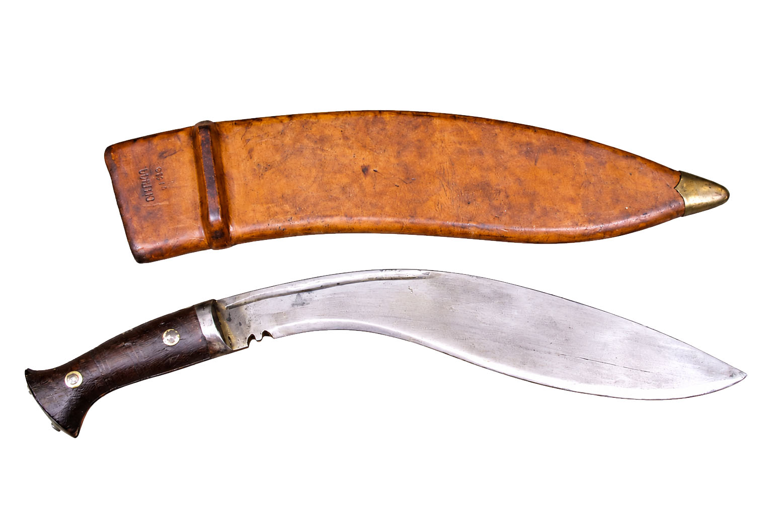WWI MK II military kukri (khukuri) with wooden grip, two rivets, steel bolster and butt cap, beside its leather scabbard with brass chape