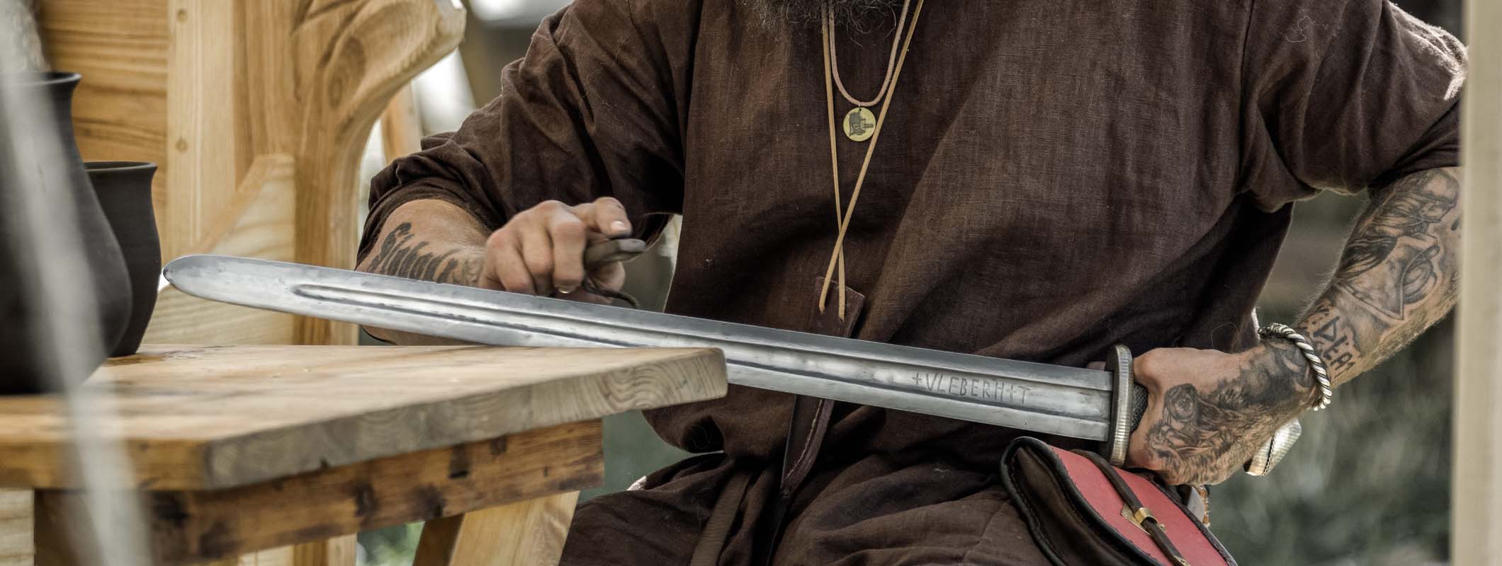 Unsharpened blunt sword ready for Renaissance Faire — hand-forged stage combat grade blade from Everest Forge Nepal
